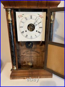 Antique Seth Thomas O. G. Weights Driven Column Clock 30-Hour, Time/Strike