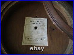 Antique Seth Thomas deep wooden clock case with glass hinged wall hanging round