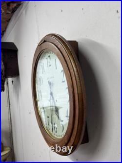 Antique restored 30 day Seth Thomas large oak arcade clock 23 in gallery lobby