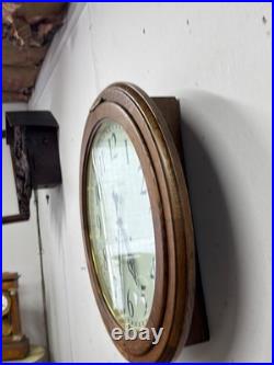 Antique restored 30 day Seth Thomas large oak arcade clock 23 in gallery lobby