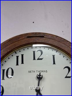 Antique restored 30 day Seth Thomas large oak arcade clock 23 in gallery lobby