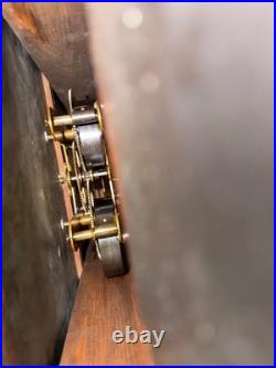 Antique restored 30 day Seth Thomas large oak arcade clock 23 in gallery lobby