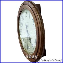 Antique restored 30 day Seth Thomas large oak arcade clock 23 in gallery lobby