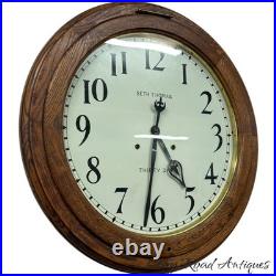 Antique restored 30 day Seth Thomas large oak arcade clock 23 in gallery lobby