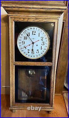 Vintage Howard Miller Oak Wall Clock 612 463