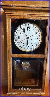 Vintage Howard Miller Oak Wall Clock 612 463